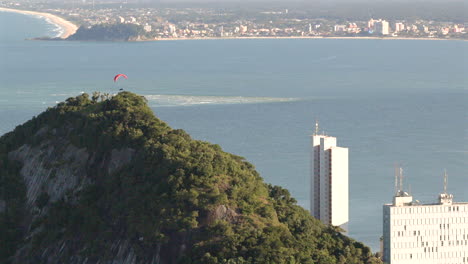aerial fly over rochas da praia brava near caiobá beach with distant matinhos and guaratuba municipality, paraná, brazil