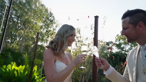 romantic wedding toast: happy couple celebrating their marriage