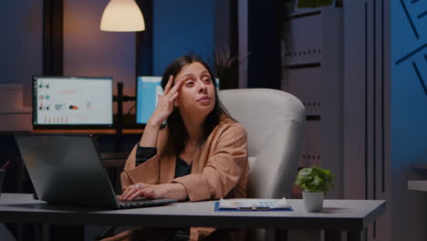 overworked exhausted businesswoman working in startup office checking management strategy