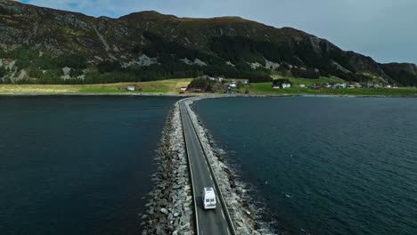 minivan trip on the bridge to runde island , norway