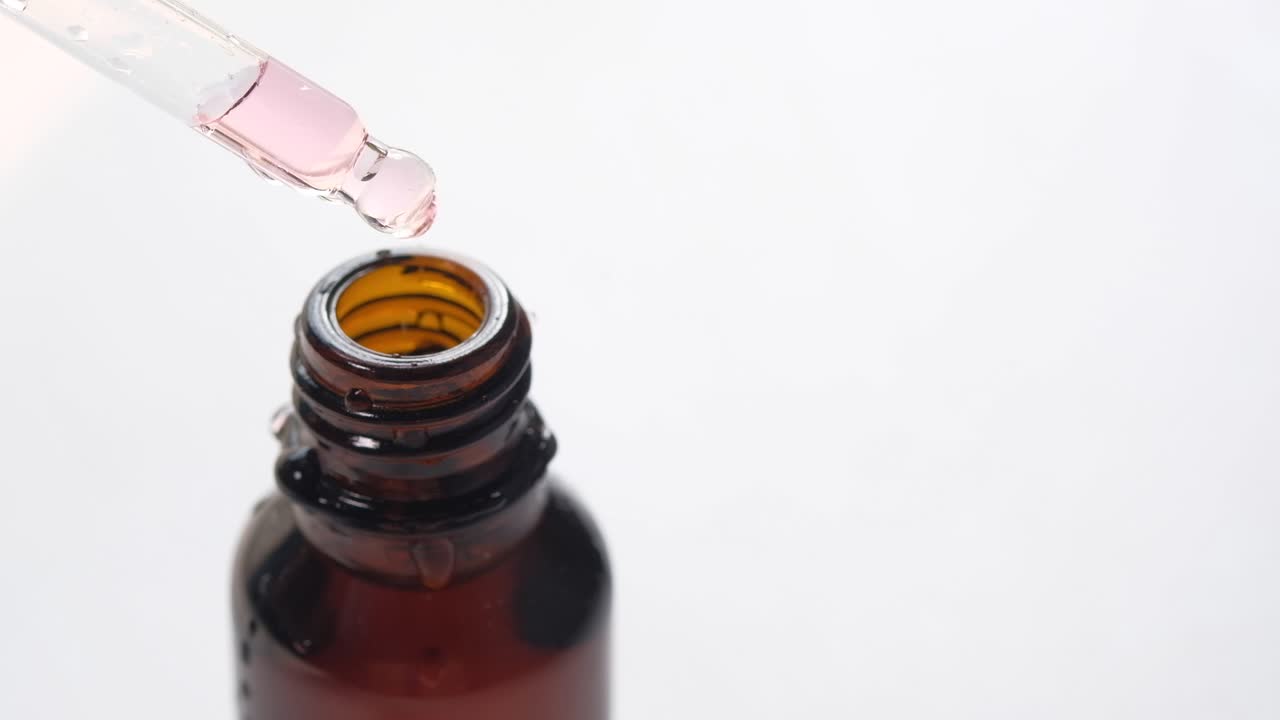 Dropper Bottle with Pink Liquid