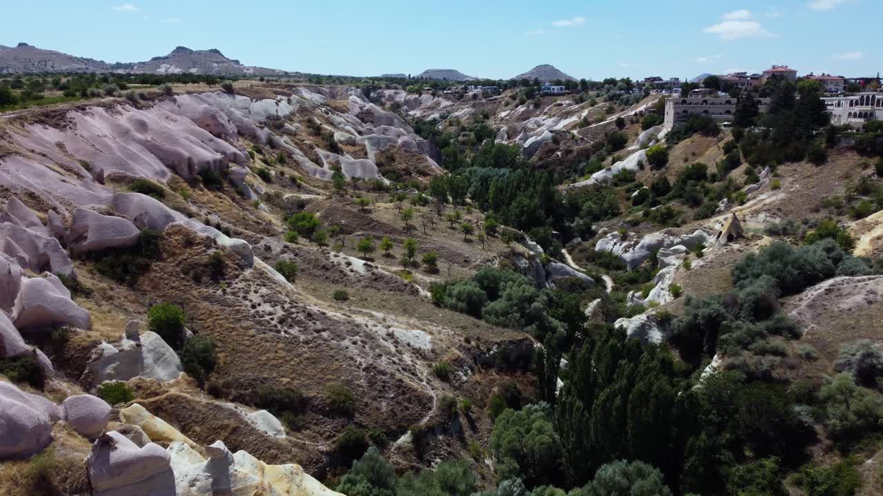 Pigeon valley, cappadocia with unique rock formations and greenery, aerial view