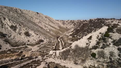 Aerial-shot-with-dolly-in-of-big-mountains-in-Croatia-on-sunny-day