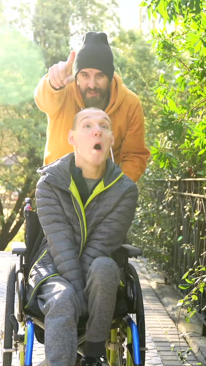 Man Pushing Friend in Wheelchair