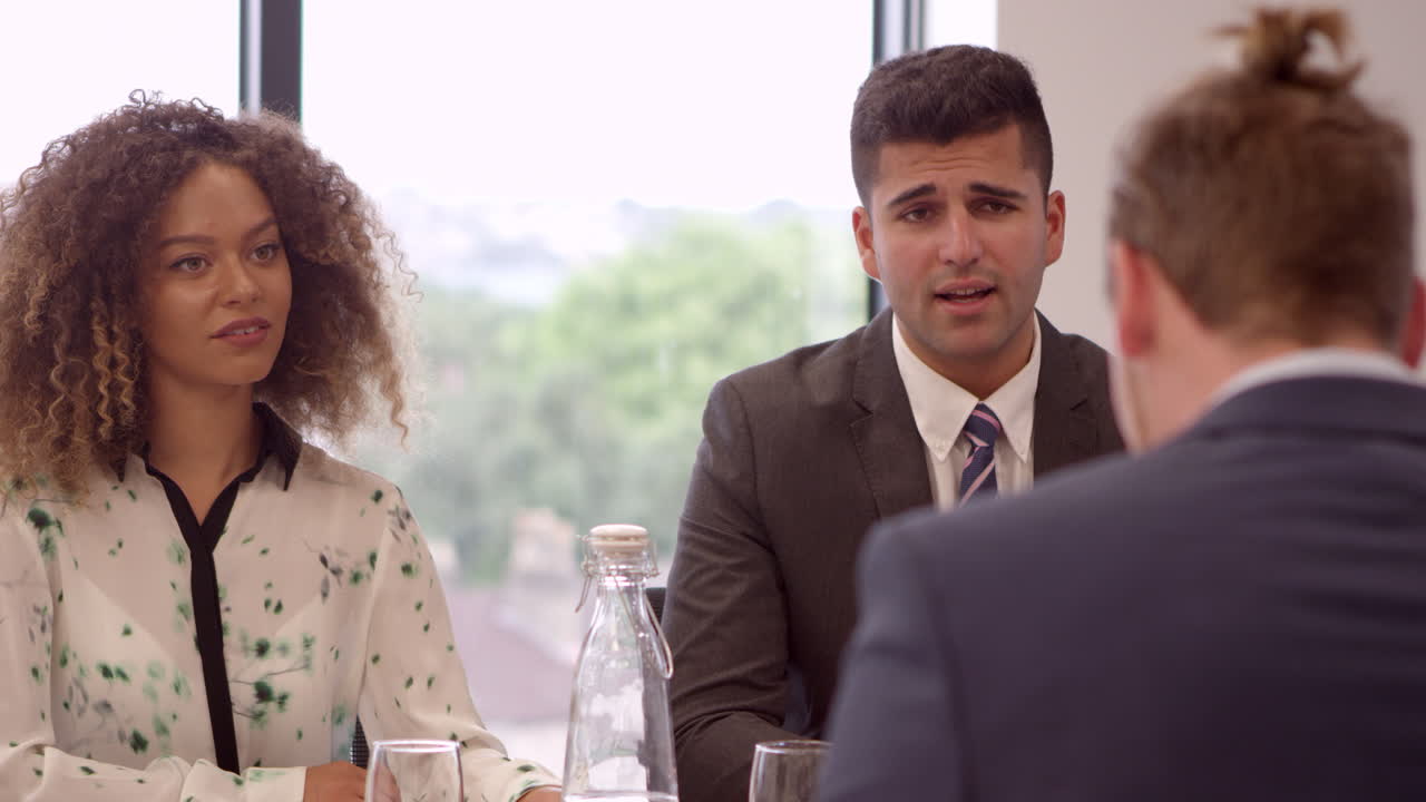 Male Job Candidate Being Interviewed In Office Shot On R3D