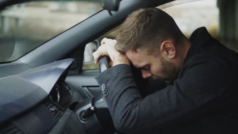 stressed man in a car