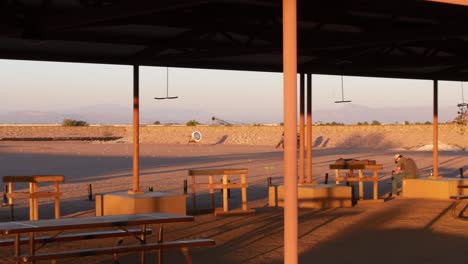 in chandler arizona, an archery range sits on top of the repurposed landfill now cultivated into a garden and park.