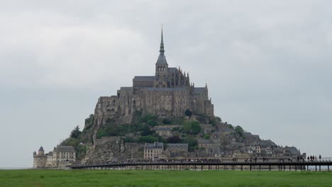 slow motion static handheld shot of mount saint michele in normandy at a cloudy day
