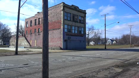 an old abandoned storefront suggests economic depression