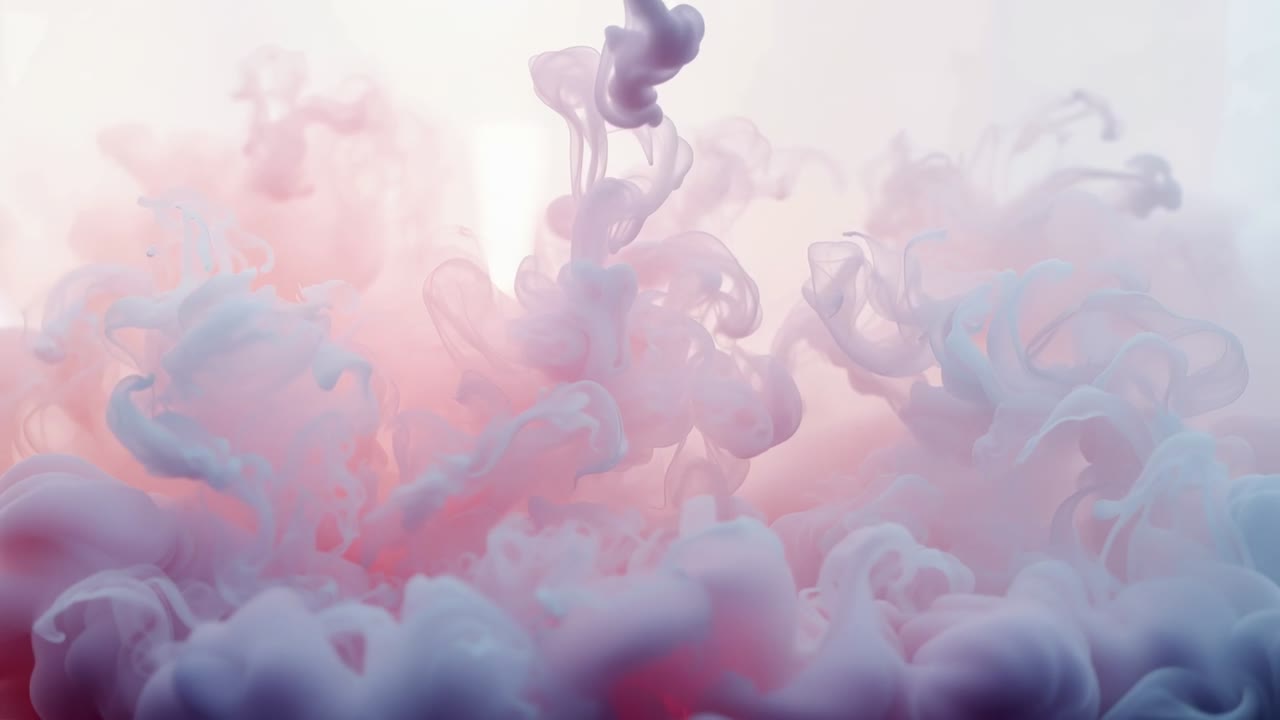 Descending filament injecting pink, lavender ink plumes forming in glass tank backlit feeding base