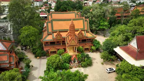 tropical ancient landmark, ornate religious building, slow aerial orbit