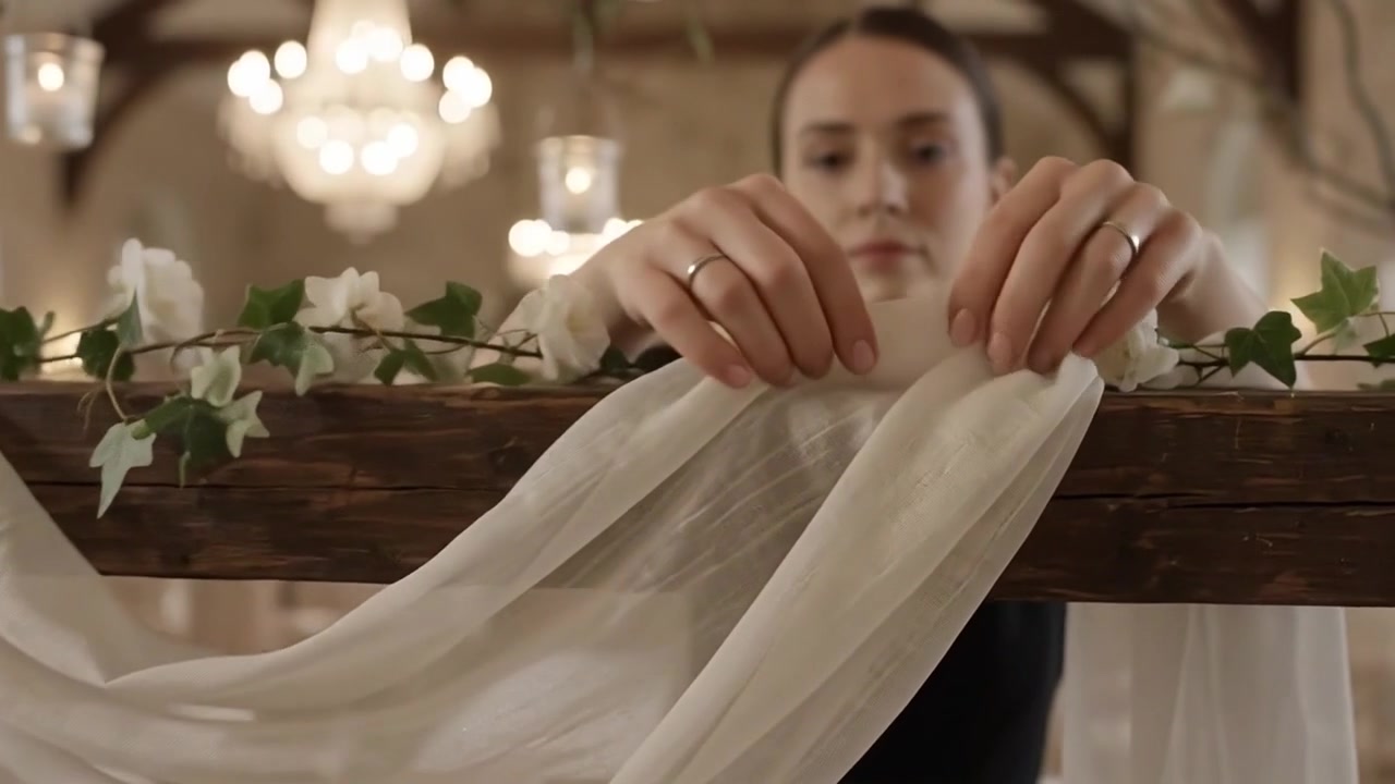 Wedding Planner Decorating Wooden Arch with Fabric and Flowers
