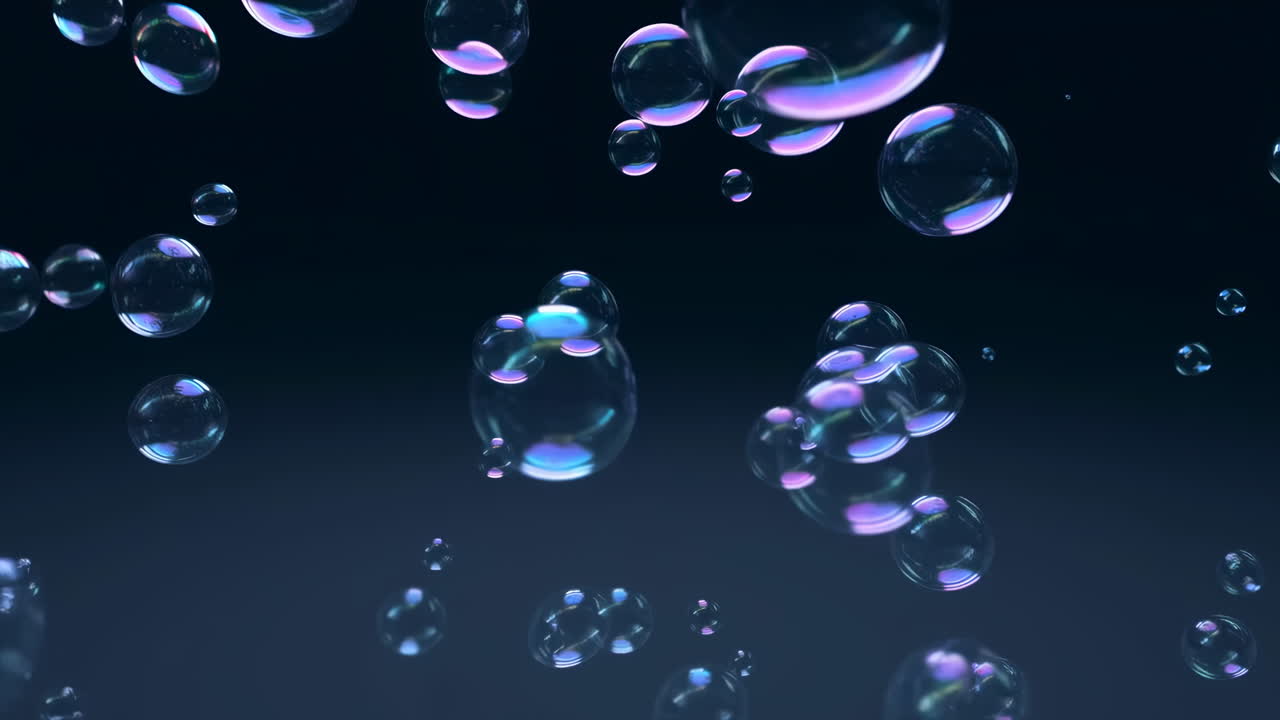 Iridescent Soap Bubbles Floating Upwards on a Dark Background