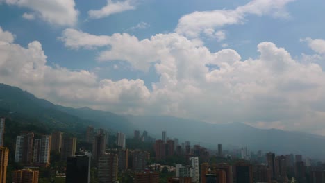 Aerial-View-of-El-Poblado-Neighborhood-on-Beautiful-Day-with-Blue-Skies