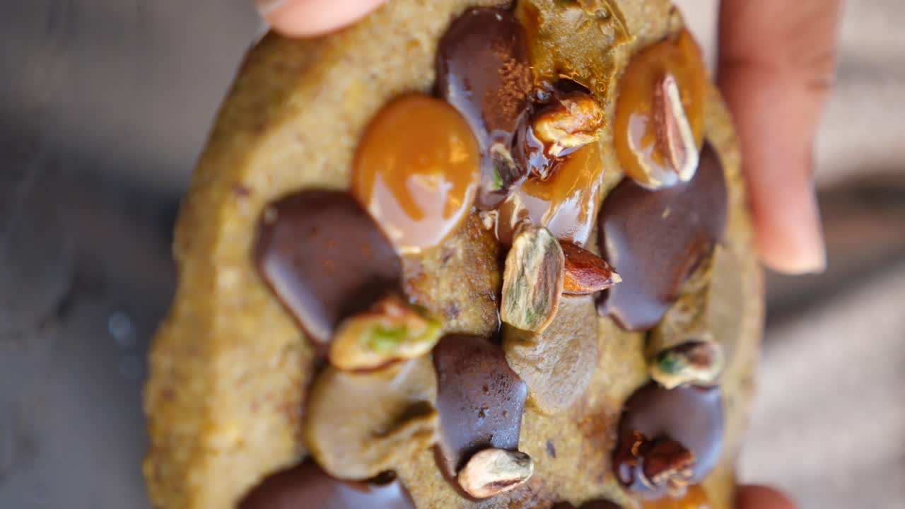 Hand holding decorated cookies