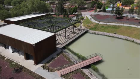 Drone-view-of-a-Construction-park-with-a-pond-in-the-center-in-Mexico