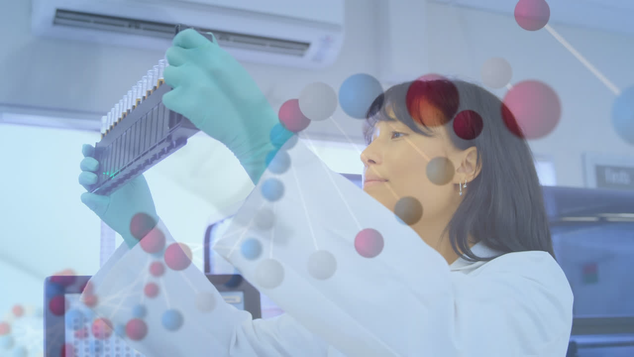 연구실에서 실험관 랙을 확인하는 아시아 여성 과학자 위에 회전하는 dna 나선의 애니메이션