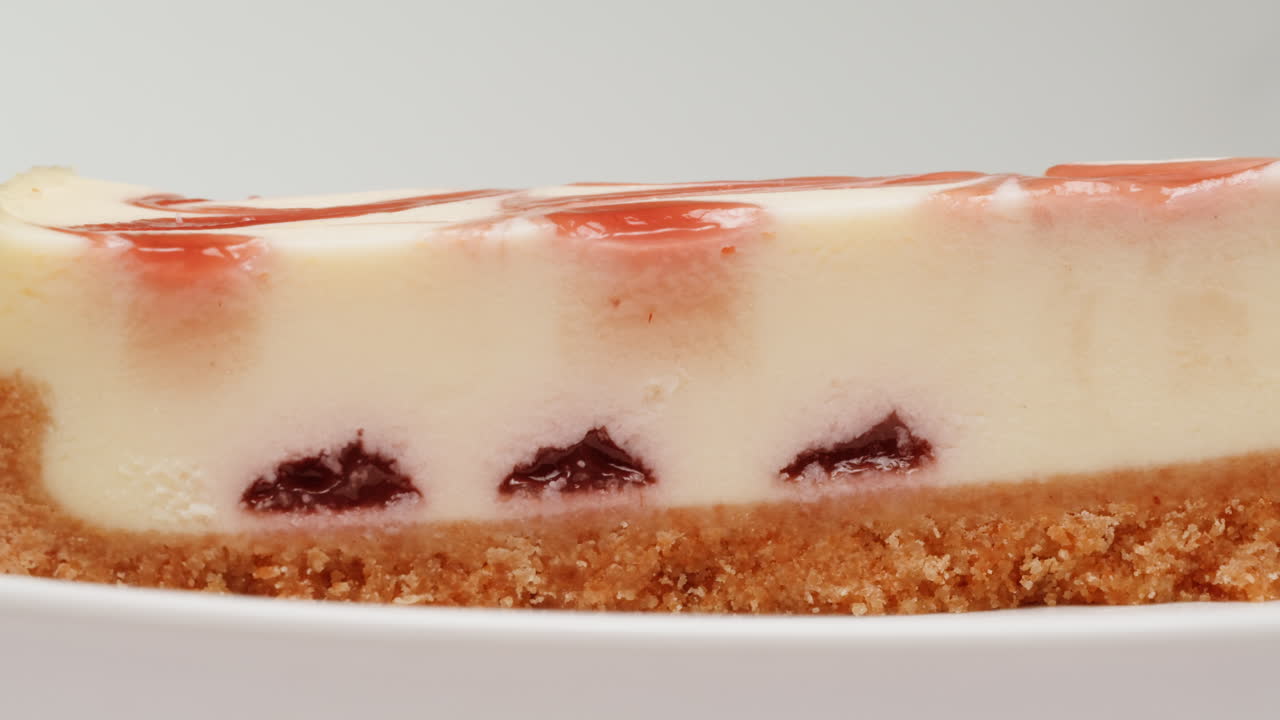 Close-up of a Slice of Strawberry Cheesecake