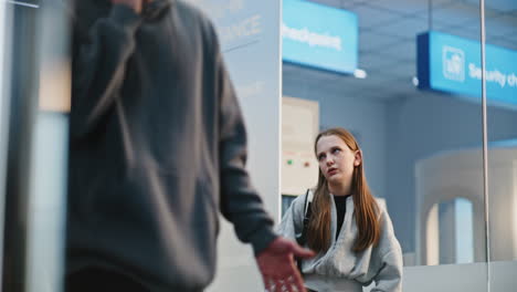 airport passengers at security check