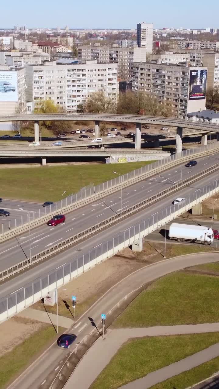 Vertical aerial shot of complex highway system, overpasses and intersections