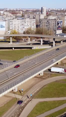 vertical aerial shot of complex highway system, overpasses and intersections
