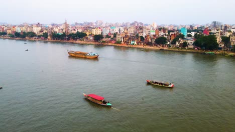 boat traffic on buriganga river, cargo passenger ship dhaka bangladesh