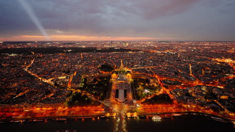 panoramic night view of paris city from the eiffel tower in france