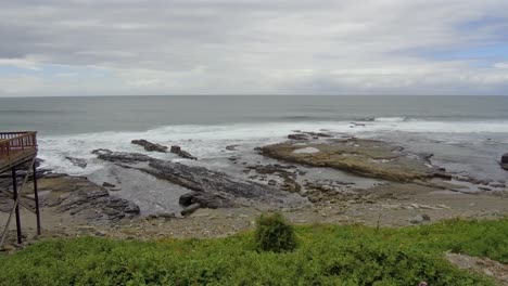 Left-to-right-pan-of-the-ocean-at-the-East-London-Beach-Front-in-South-Africa