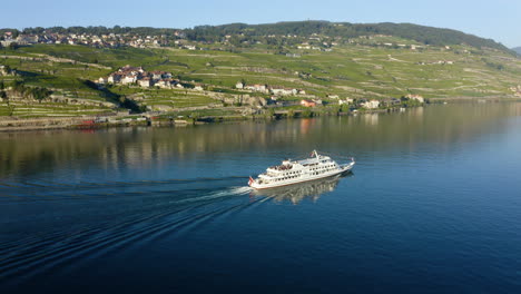 aerial view of lausanne cruise boat with tourists sailing at lake geneva in switzerland