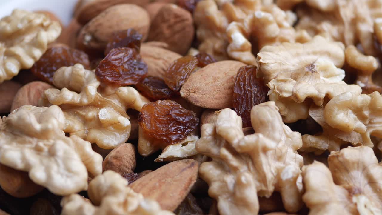 Close-up of Walnuts, Almonds and Raisins