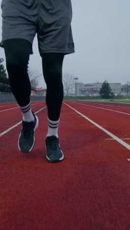 man running on a track