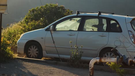 white car sunset golden hour jerusalem mountains view