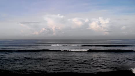 Aerial-over-the-coast-of-Bali,-Indonesia-at-sunrise