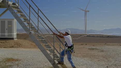 climbing metal stairs, worker with wind turbine and animation of data visualization