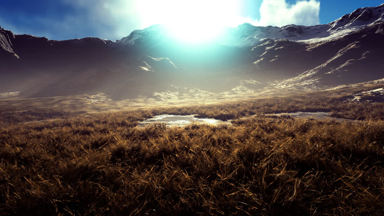 Majestic mountain landscape bathed in ethereal sunlight at dawn