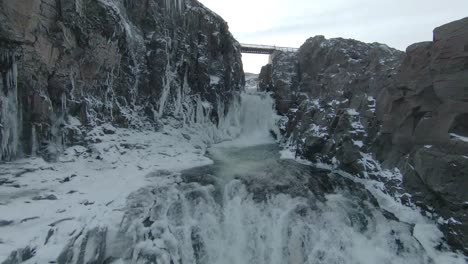 fpv view of studlagil basalt canyon with volcanic basalt columns iceland