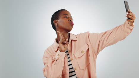 Peace-hands,-kiss-and-black-woman-with-selfie