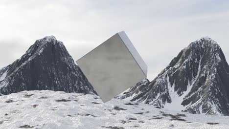 cubo abstracto en las montañas nevadas