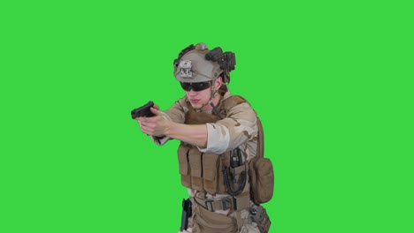 army man pointing gun in multiple directions ready for combat on a green screen, chroma key