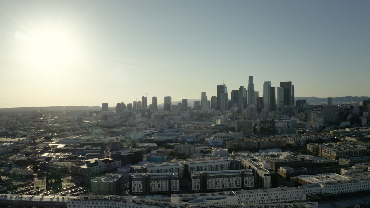 Panoramic view of downtown Los Angeles skyline at sunrise or sunset