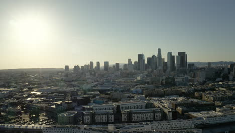 panoramic view of downtown los angeles skyline at sunrise or sunset