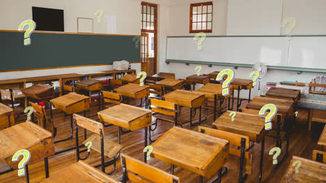 Animation-of-green-question-marks-over-chairs-and-desks-in-empty-school-classroom