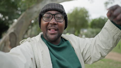 Black-man,-influencer-and-selfie-in-nature-for