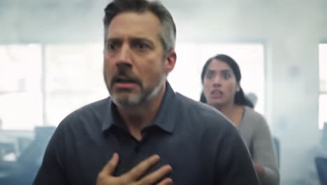 two people urgently escape a hazardous situation in a smoke-filled environment. their expressions reflect fear and determination as they navigate through the chaos.