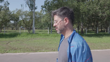 man walking happily and self-aware, slow motion