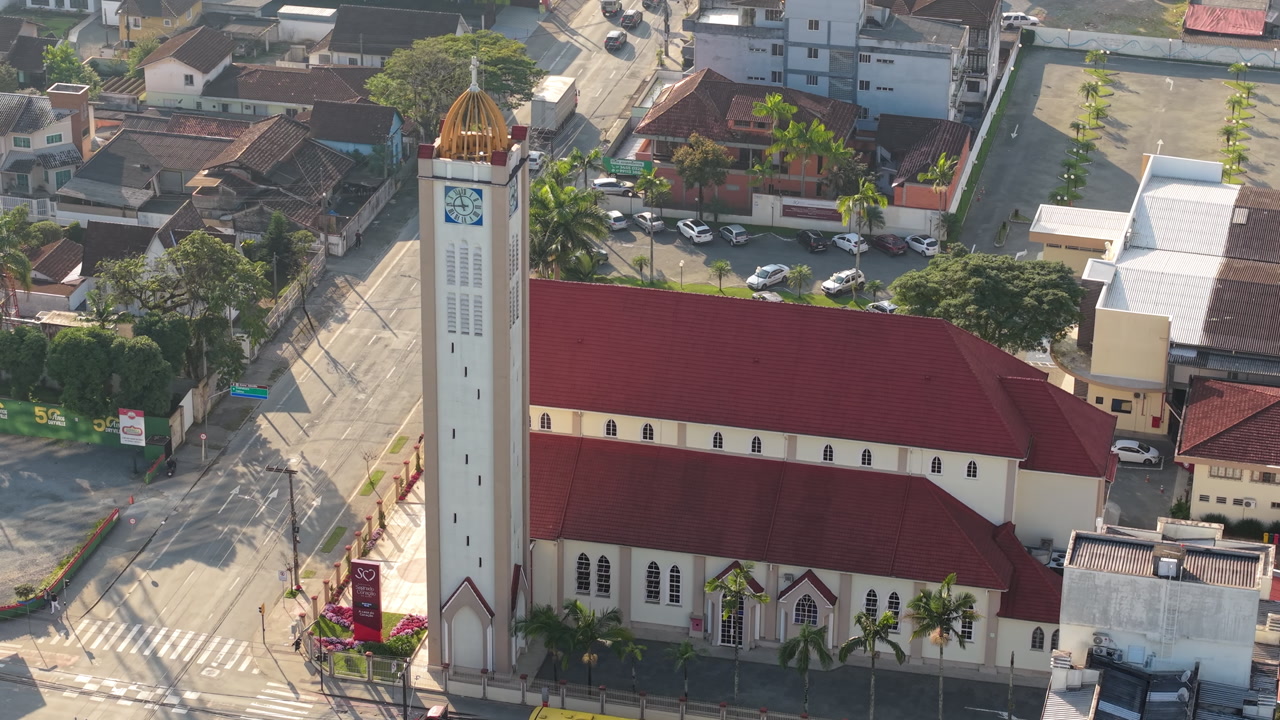 Aerial view highlighting Sao Francisco Xavier Cathedral, prominent landmark in Joinville, Santa Catarina, revealing architectural details and urban context of Brazilian religious structure