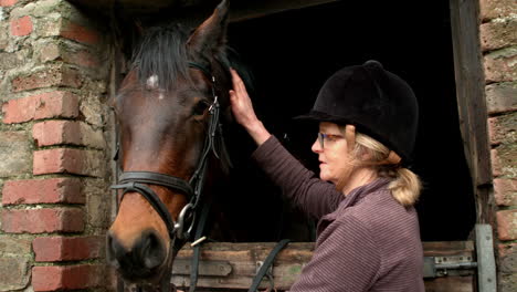 pretty woman hugging her horse