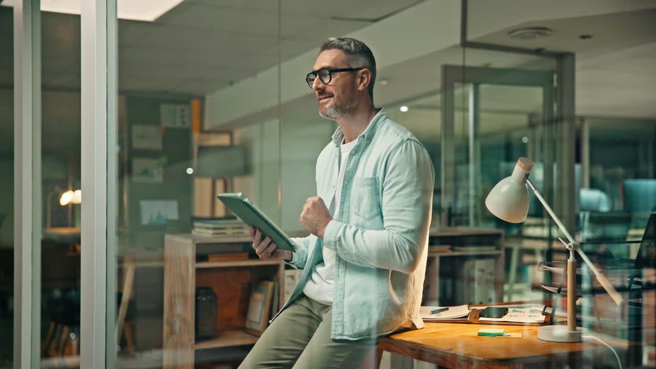 Man working on clipboard in office