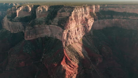 aerial approach over deep gorge towards south rim of grand canyon