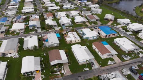 4k drone video of tarps on roofs of mobile homes damaged by hurricane ian in north port, florida - 26